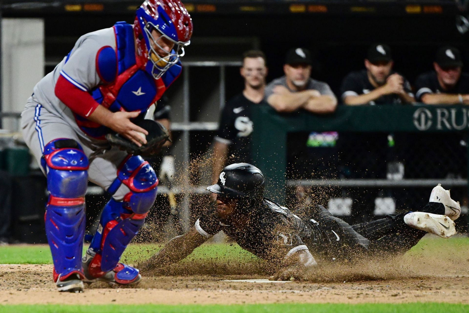 Tim Anderson slides into home plate to tie the game up in extra innings. Toronto Blue Jays v Chicago White Sox